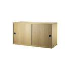 String Shelving - Sliding Door Cabinet.